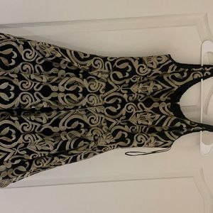 Size M,Worn once! Great quality dress with beautiful gold lace